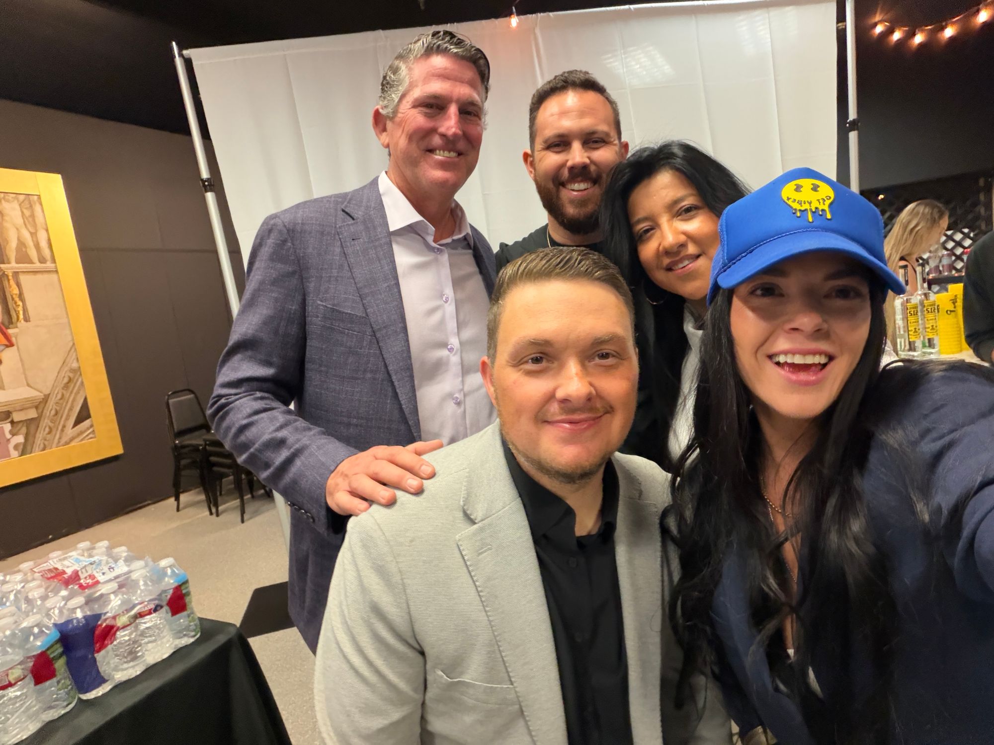 Vibey members taking a selfie at an event