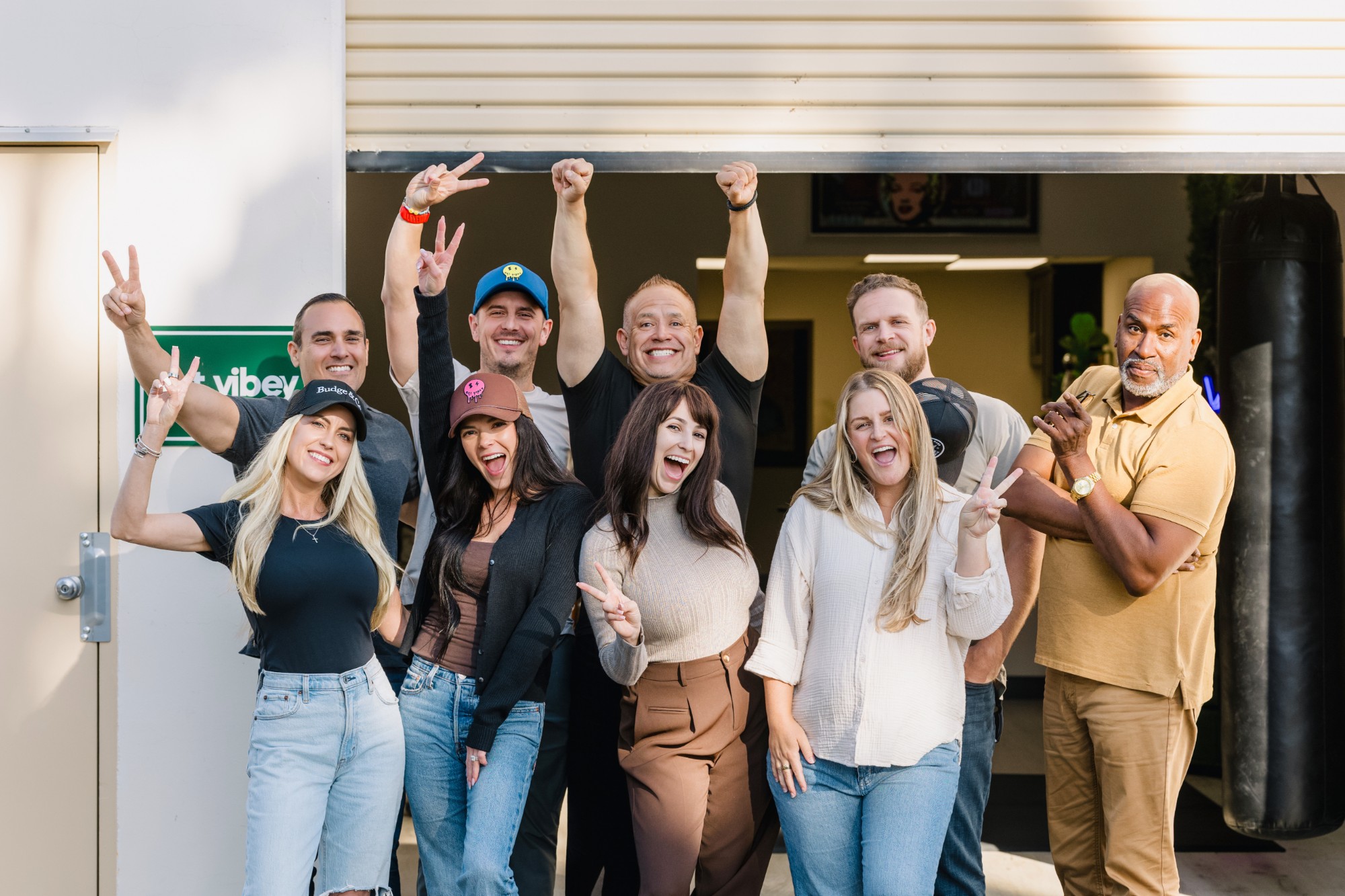 The Get Vibey team celebrating outside Vibey HQ
